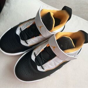 Jordan Black, White, and Orange Athletic Shoes
